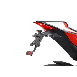 SUPPORT DE PLAQUE AVEC ECLAIREUR APRILIA RSV4 (09-20) (vendu sans cli